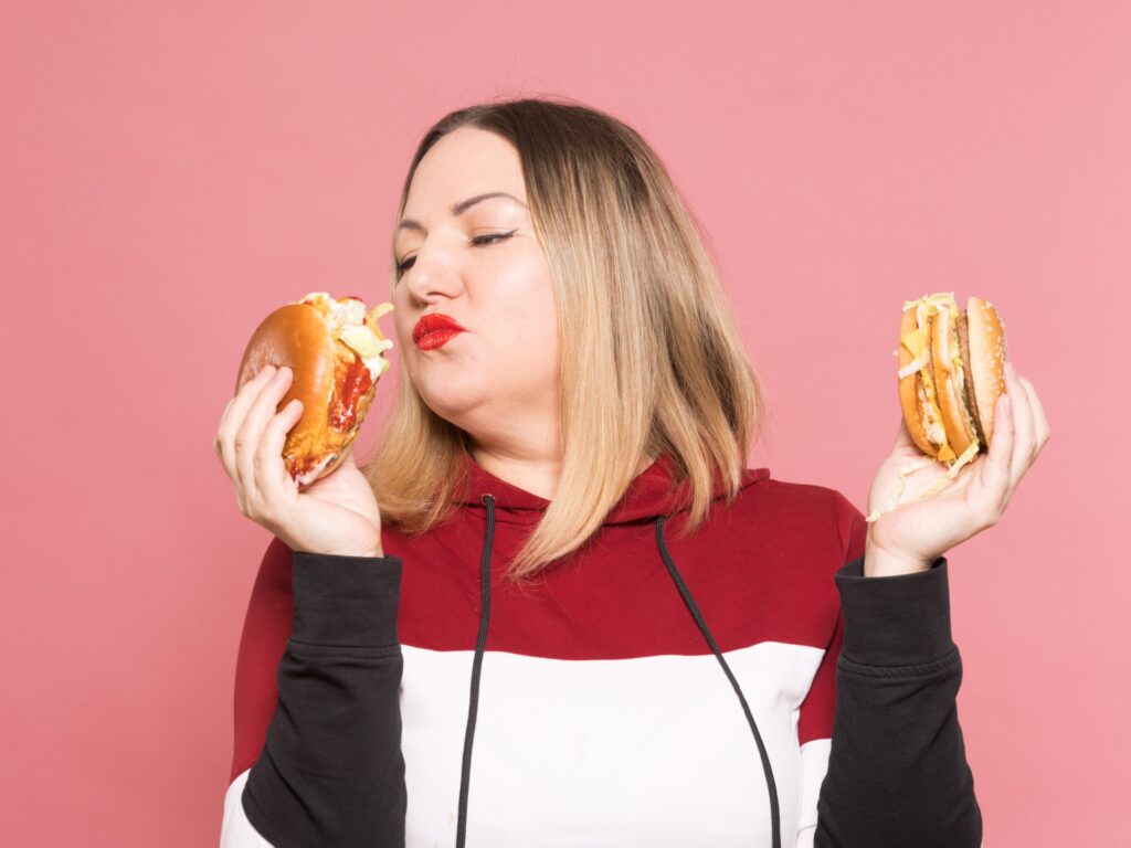 Treatment for binge eating through electrical stimulation of the brain