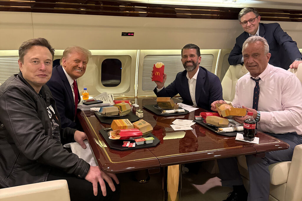 A photo of Trump eating a burger and drinking a Coke sparks widespread criticism