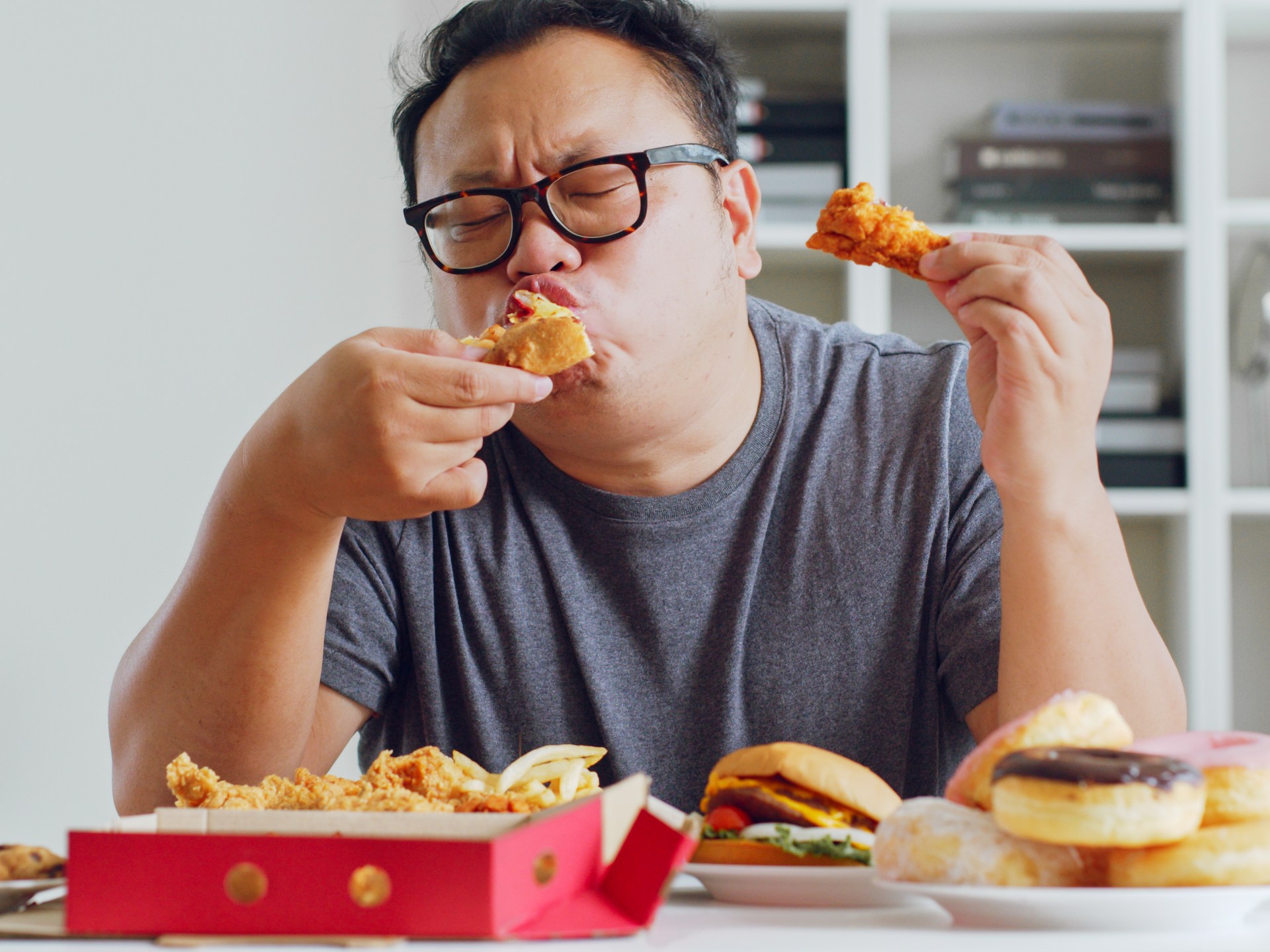 How much can your stomach expand after eating a large meal?