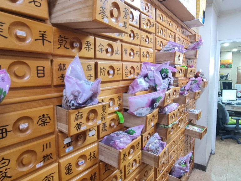 Dozens of drawers that include strange and rare types of medicinal herbs at the Korean doctor's clinic