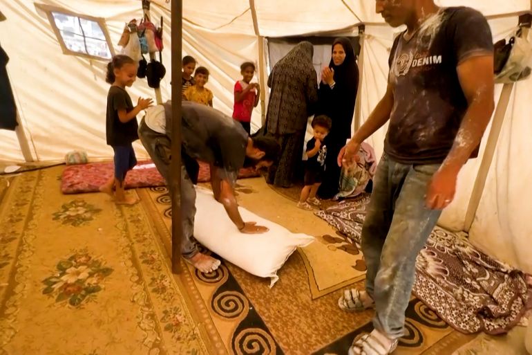 Faris's journey for flour .. A father in Gaza is biting his soul with a loaf of bread