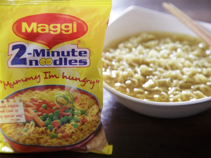 A packet and a cooked bowl of Maggi 2-Minute Noodles, manufactured by Nestle India Ltd., are arranged for a photograph in New Delhi, India, on Monday, June 15, 2015. Nestle SA said the US Food and Drug Administration is testing samples of imported Maggi noodles after the worlds largest food company halted sales in India when regulators said they contained poor levels of lead.