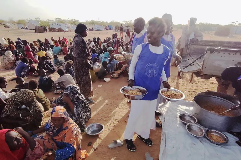 Lentils, rice, and porridge... meals are not enough to satisfy the hungry... Source: Al Jazeera Net