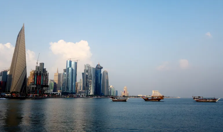 Soccer Football - FIFA World Cup Qatar 2022 - Airshow - Corniche, Doha, Qatar - December 18, 2022 The Doha skyline is pictured ahead of the airshow REUTERS/Ibraheem Al Omari