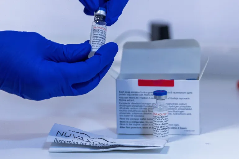 BERLIN, GERMANY - FEBRUARY 28: A medical worker prepares ampoules of the Nuvaxovid vaccine against Covid-19 by Novavax at the Tegel vaccination center on February 28, 2022 in Berlin, Germany. Germany is launching Novavax vaccinations this week, also in the hope that at least some of the people who have so far refused to be vaccinated with mRNA vaccines will see Novavax as a desirable alternative. (Photo by Carsten Koall/Getty Images)