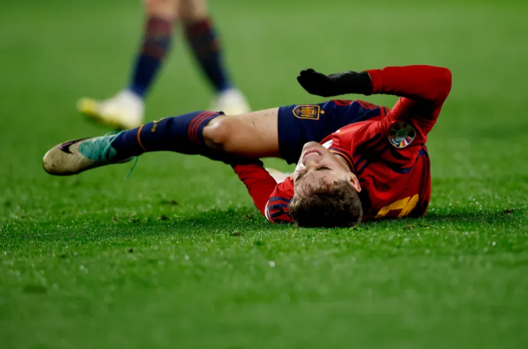 Soccer Football - Euro 2024 Qualifier - Group A - Spain v Georgia - Estadio Jose Zorrilla, Valladolid, Spain - November 19, 2023 Spain's Gavi reacts after sustaining an injury REUTERS/Juan Medina
