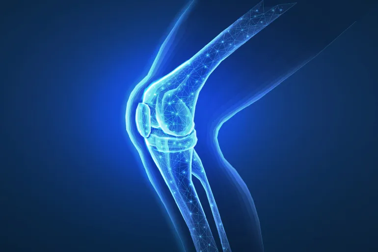 Knee joint isolated on blue. Bone health, physiotherapy care, joint disorder, glucosamine repair, orthopedic surgery, physical therapy, magnesium supplement, osteoarthritis treatment concept