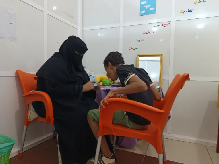 A child participates in a speech training session at the Right to Life Foundation for Cerebral Palsy Children in Aden (Al Jazeera).