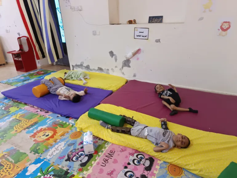 Children receiving care within one of the departments of the Right to Life Foundation in Aden (Al Jazeera)