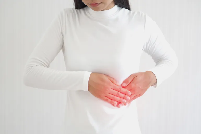 hepatosplenomegaly or hsm and ruptured spleen in woman, She touching on chest and symptoms of pain and suffering in the upper right portion of abdomen... See More by jaojormami @adobestock