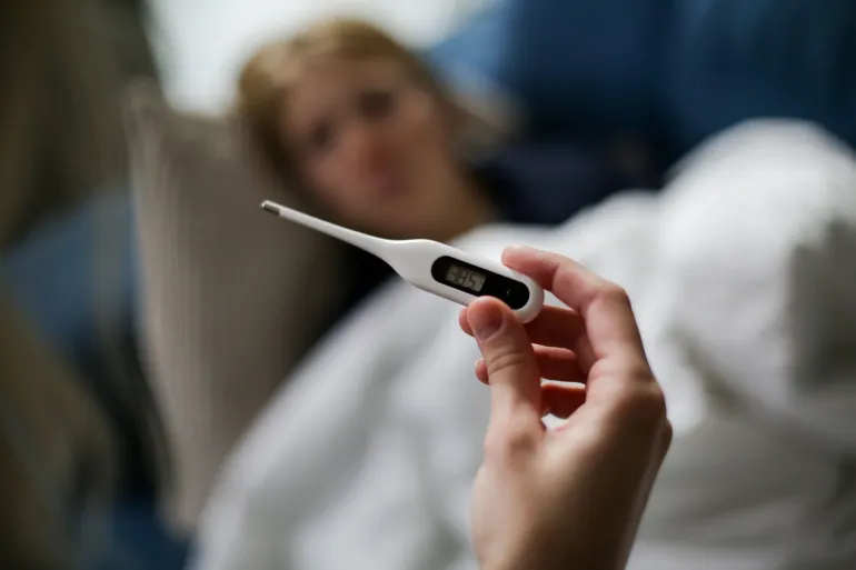 Symptoms of dengue include fever, pain, and rash, and signs of severity include bleeding, vomiting, and abdominal pain